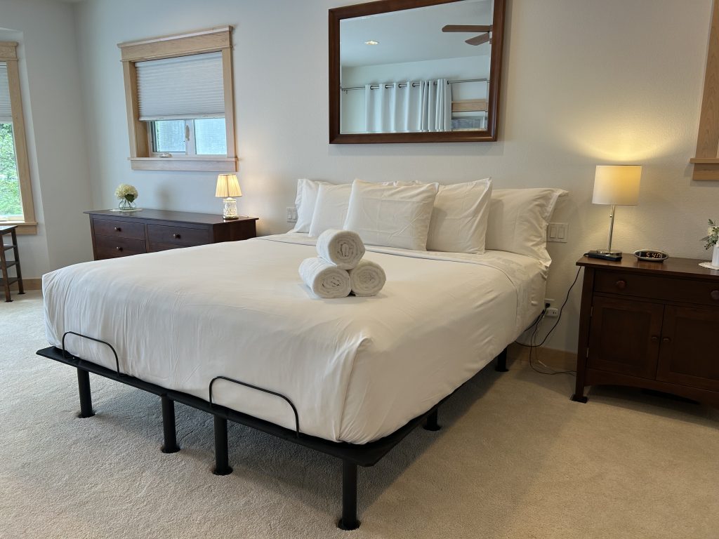Seattle Airbnb bedroom cleaned and staged with fresh linens and towels